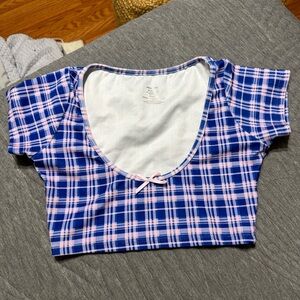 Frankie’s Bikinis blue and pink bikini top